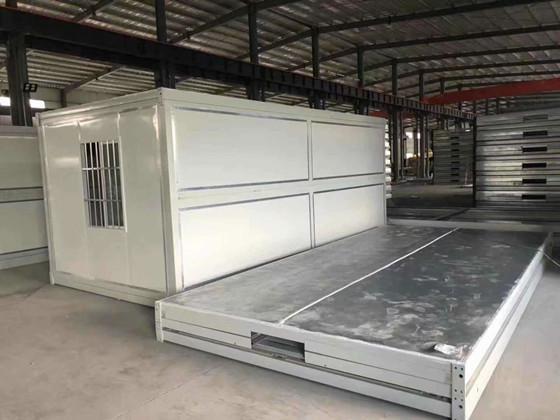 库房压缩垂着高度为400mm的折叠箱式活动房