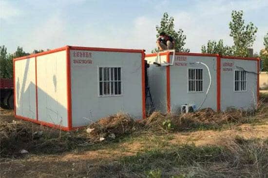 橘红色住人集装箱活动房图